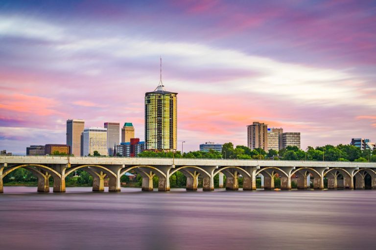 Tulsa, Oklahoma, USA downtown skyline on the Arkansas River at dusk.